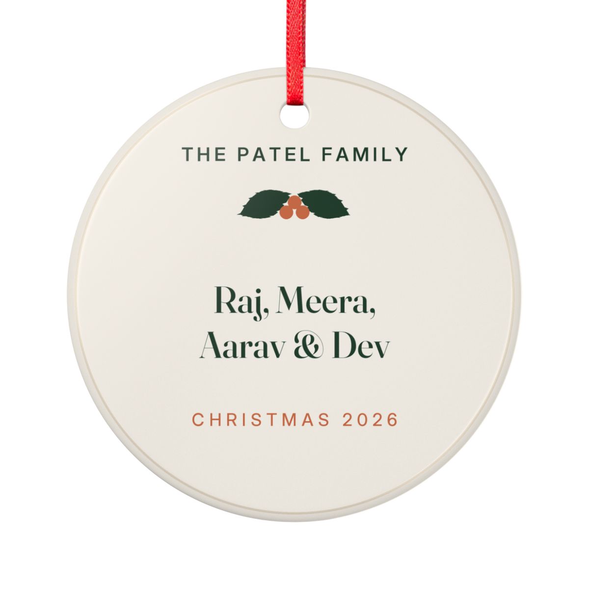 Round ceramic Christmas ornament on a red ribbon reading The Patel Family, with the names Raj, Meera, Aarav and Dev and Christmas 2026