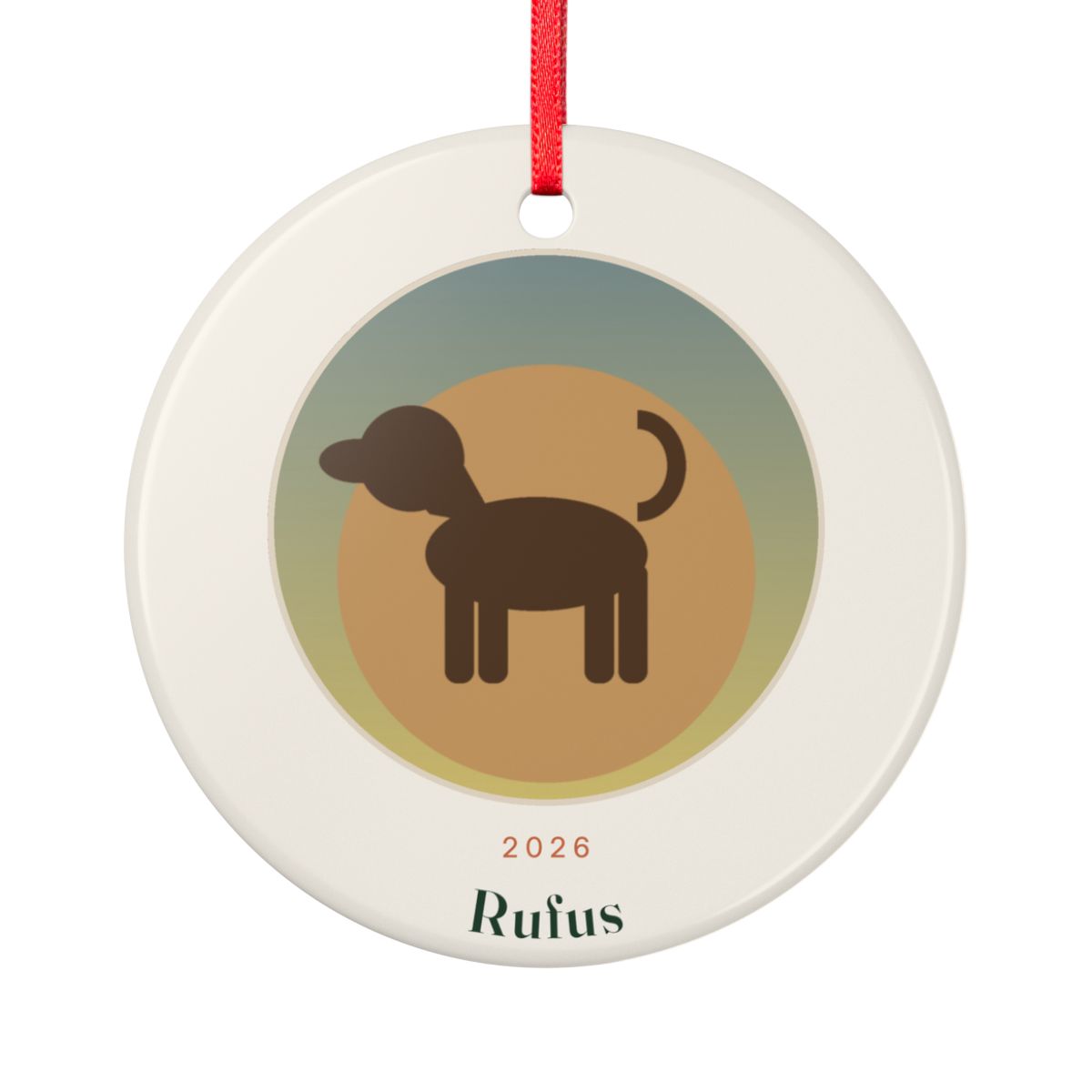 Round ceramic Christmas ornament on a red ribbon with a dog picture in a circle, the year 2026 and the name Rufus