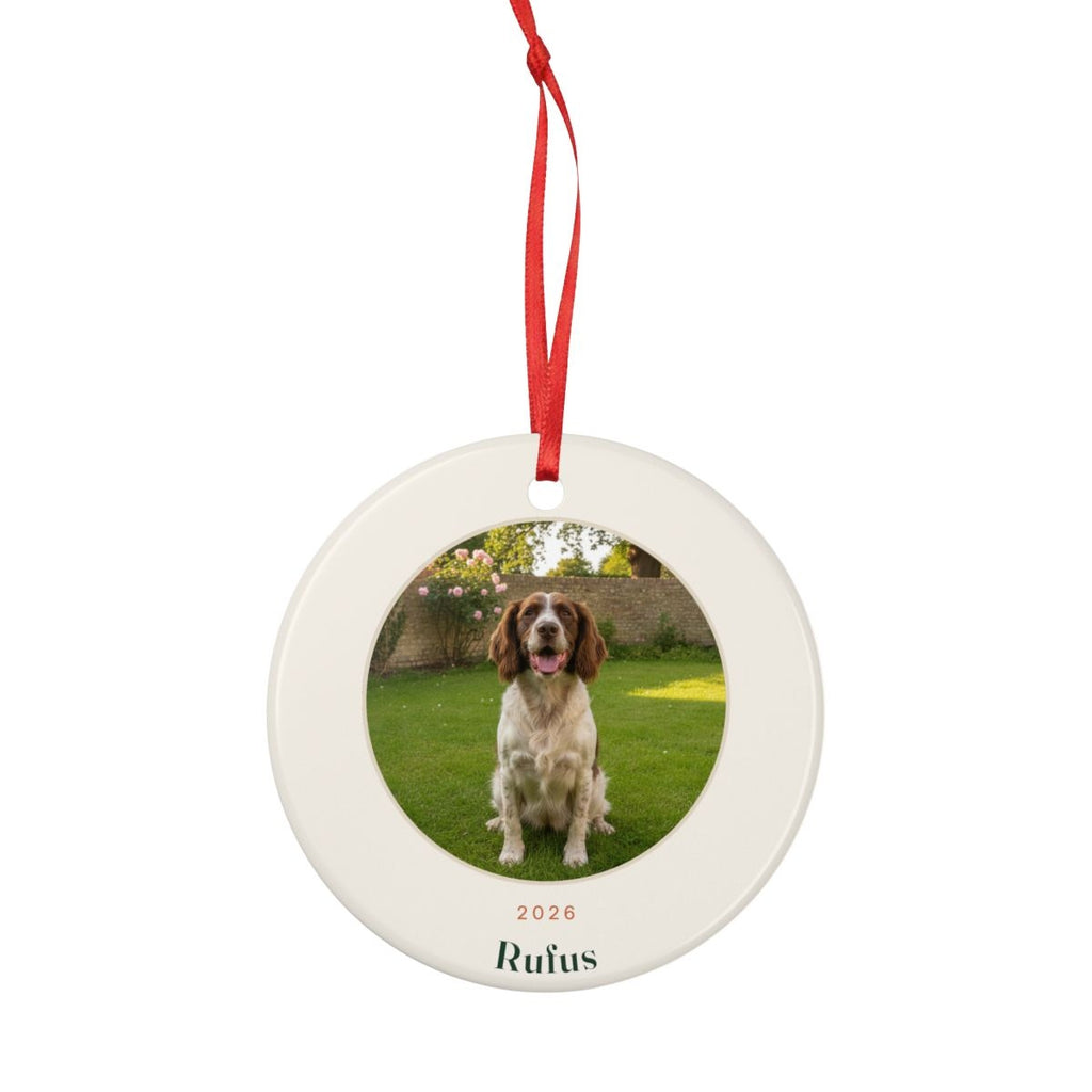 Pet photo ceramic ornament mock-up shown smaller with its full red hanging ribbon tied in a loop above