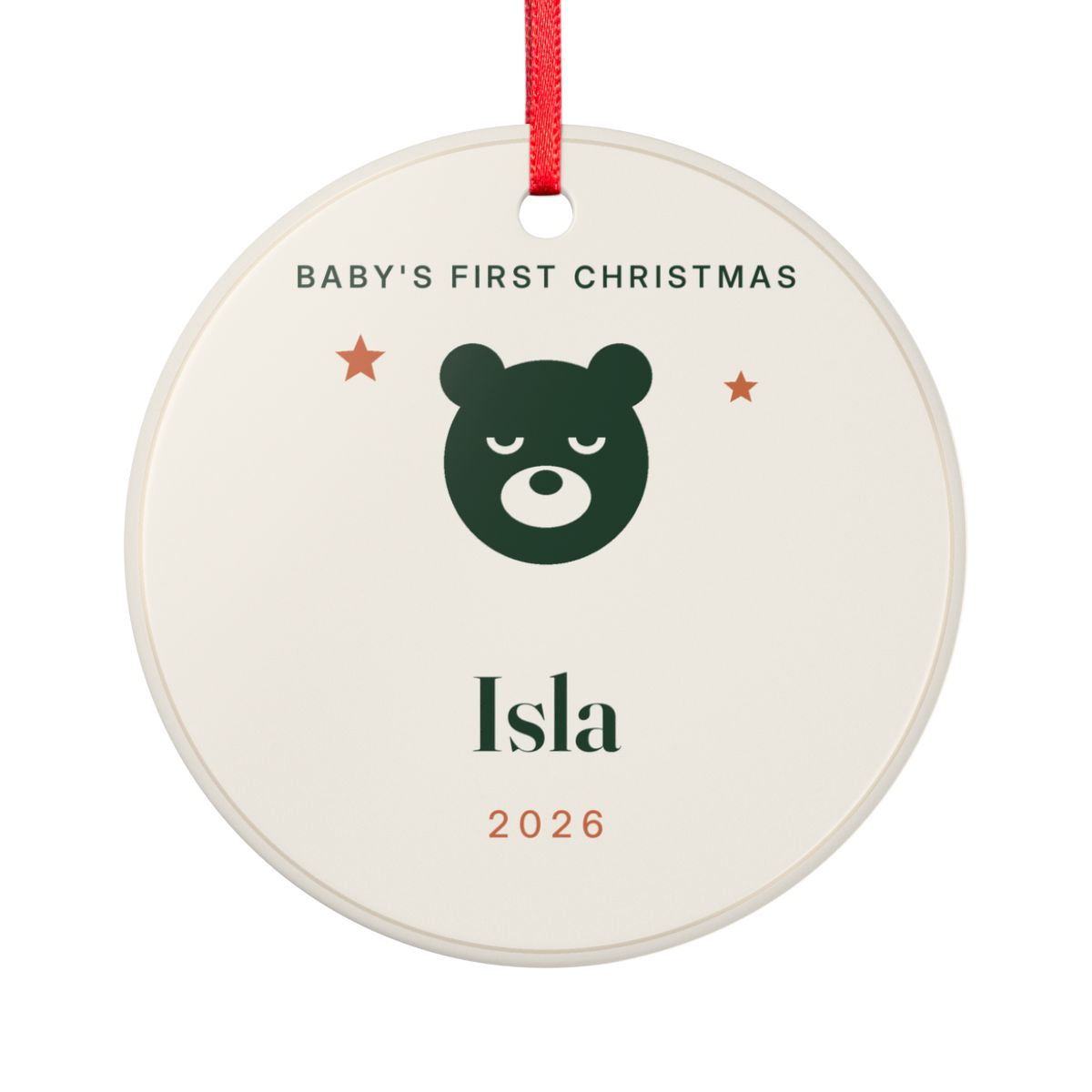 Baby's First Christmas ceramic ornament mock-up seen from the other side, with the same green bear, two stars, 'Isla' and '2026'