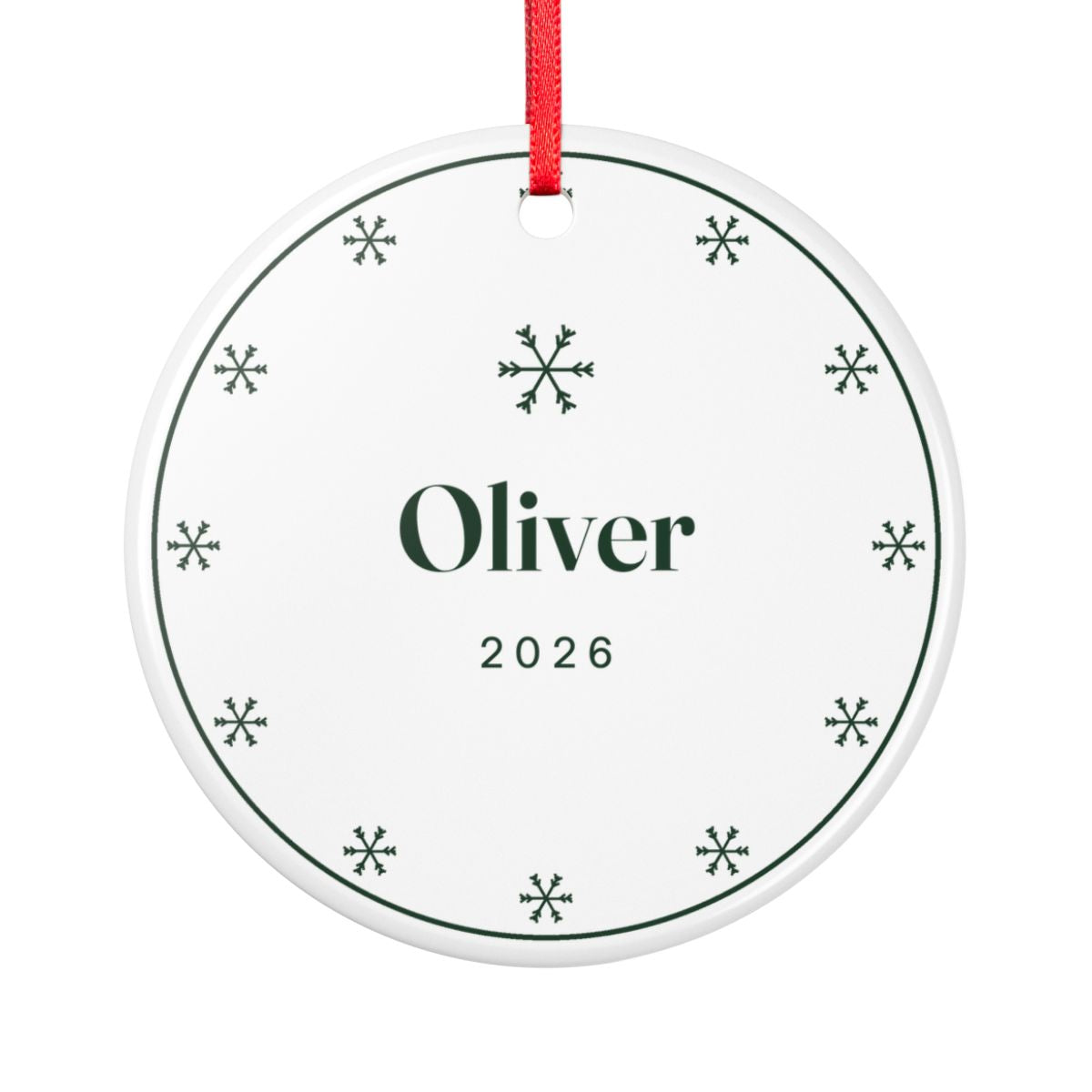 Snowflake ceramic Christmas ornament mock-up seen from the other side, with the same ring of green snowflakes, 'Oliver' and '2026'