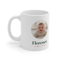 Personalised baby photo mug mock-up, handle on the left, with a round baby photo, 'Florence' and '3 May 2026'