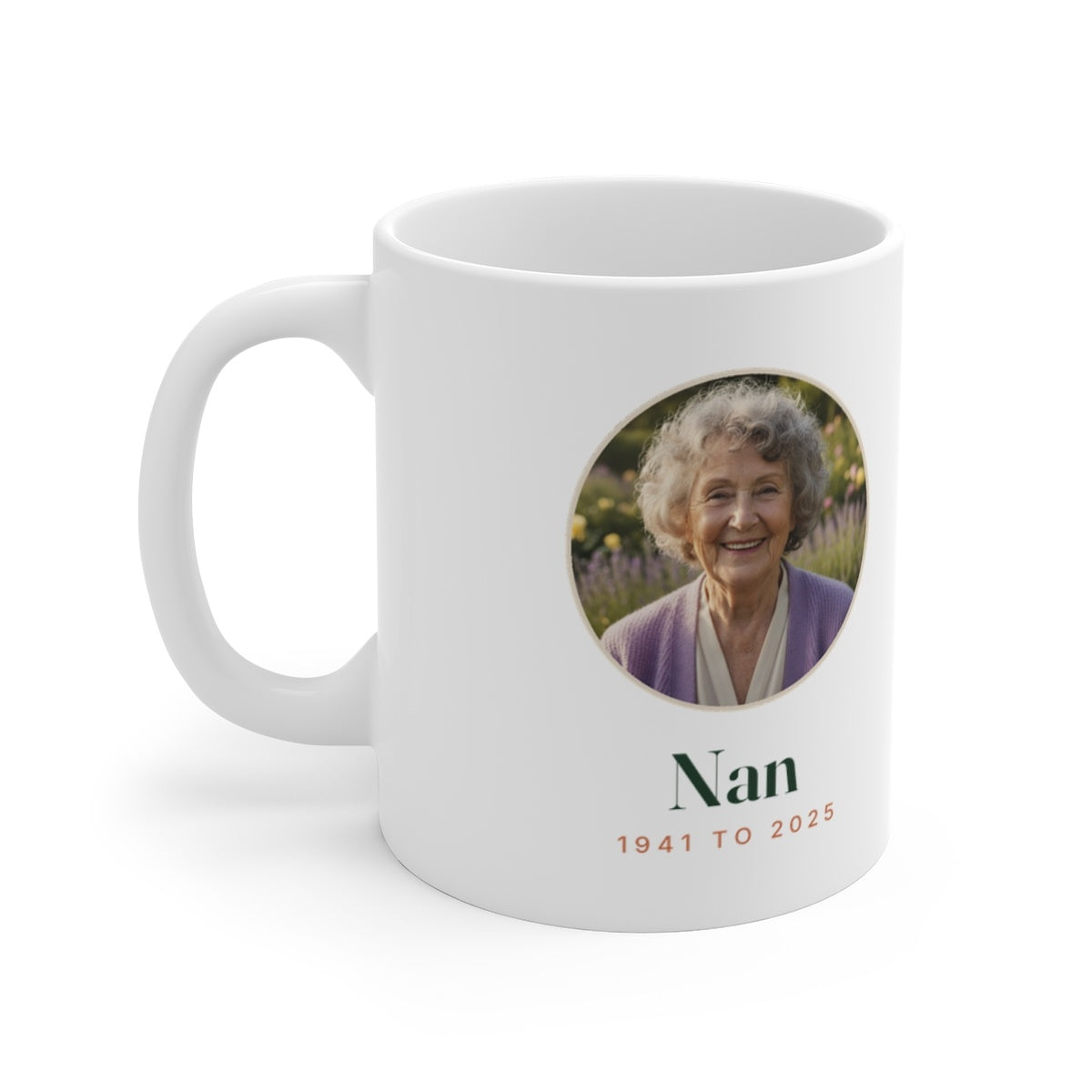 In Loving Memory photo mug mock-up, handle on the left, with an elderly woman's round photo, 'Nan' and '1941 to 2025'