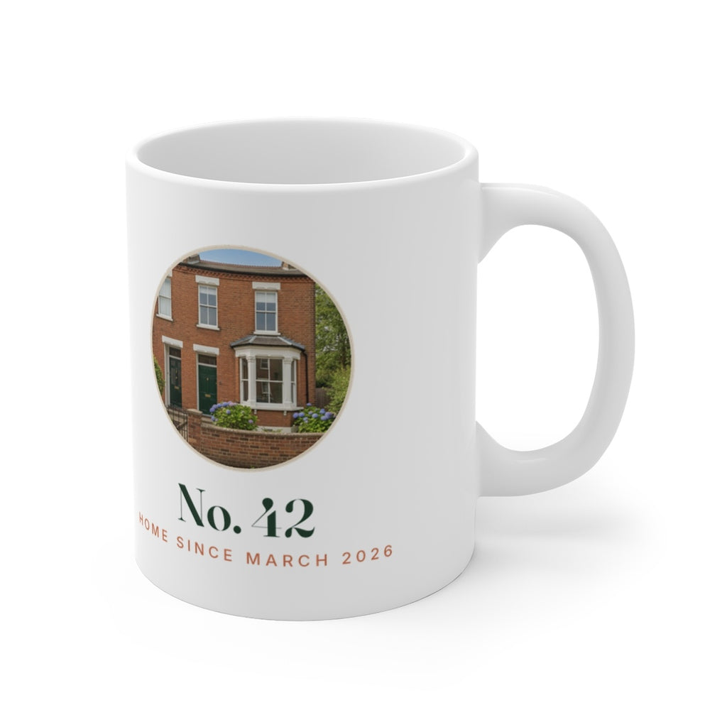 Personalised new home photo mug mock-up turned with the handle to the right, showing the round house photo and 'No. 42'