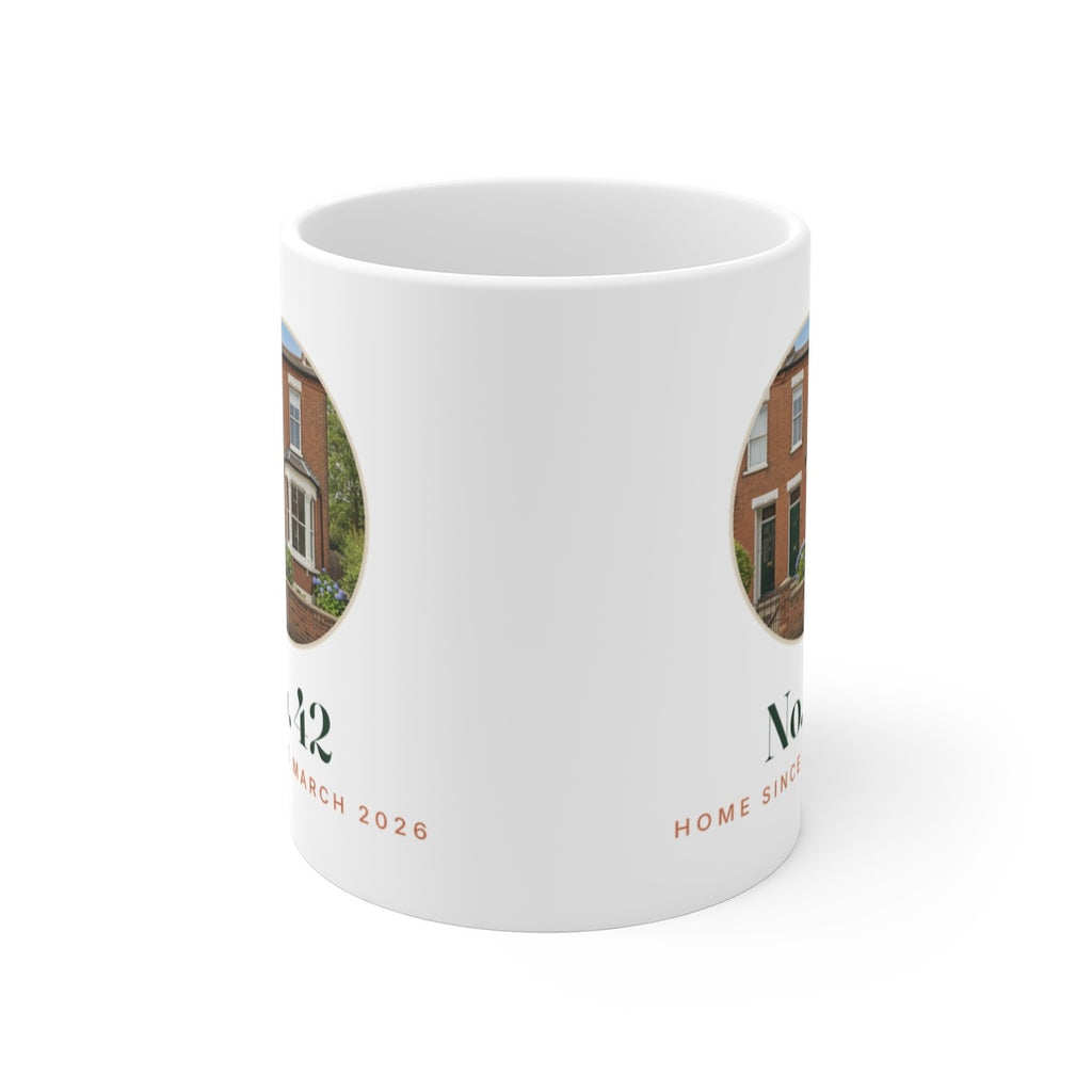 Personalised new home photo mug mock-up seen from the front with the handle hidden, the house photo wrapping onto both sides
