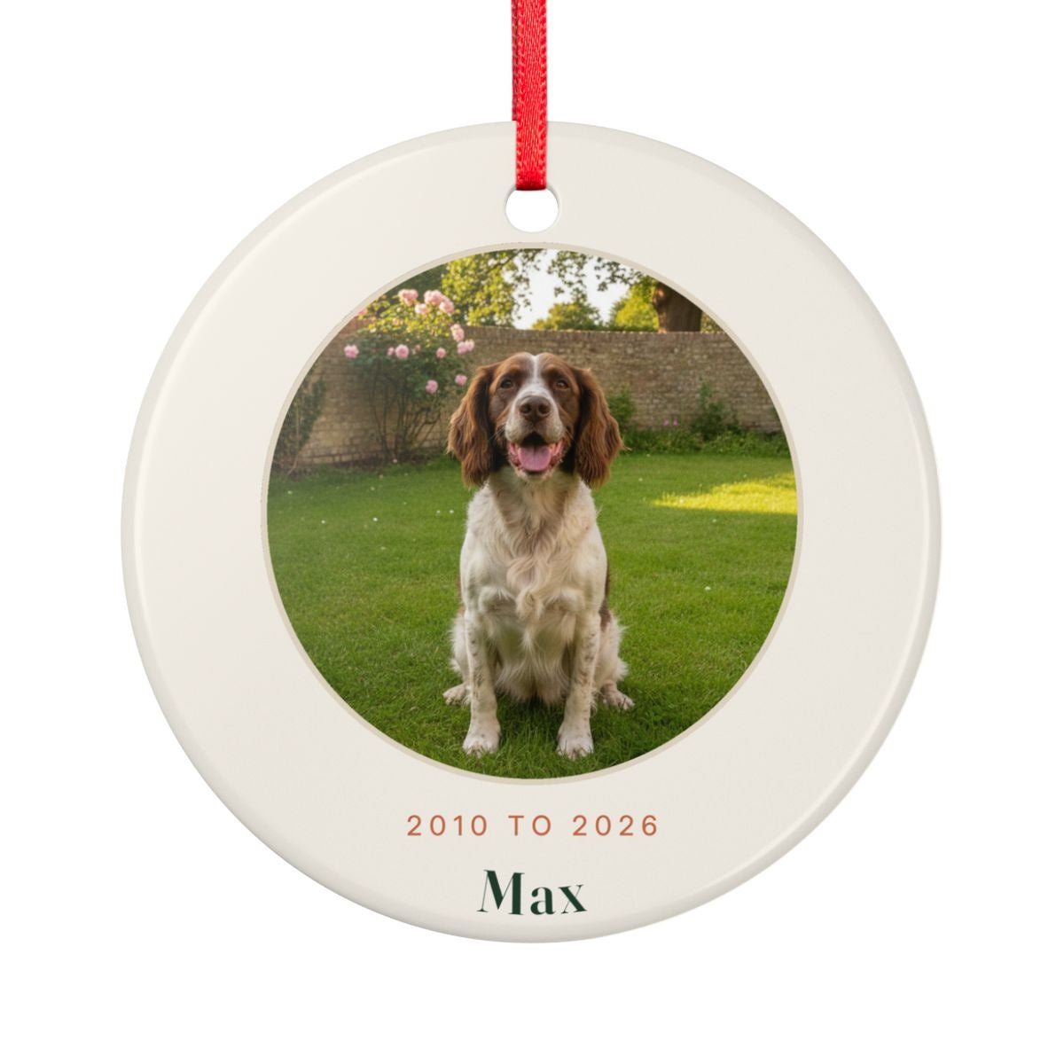 Pet memorial photo ceramic ornament mock-up seen from the other side, with the same sample spaniel photo, '2010 to 2026' and 'Max'
