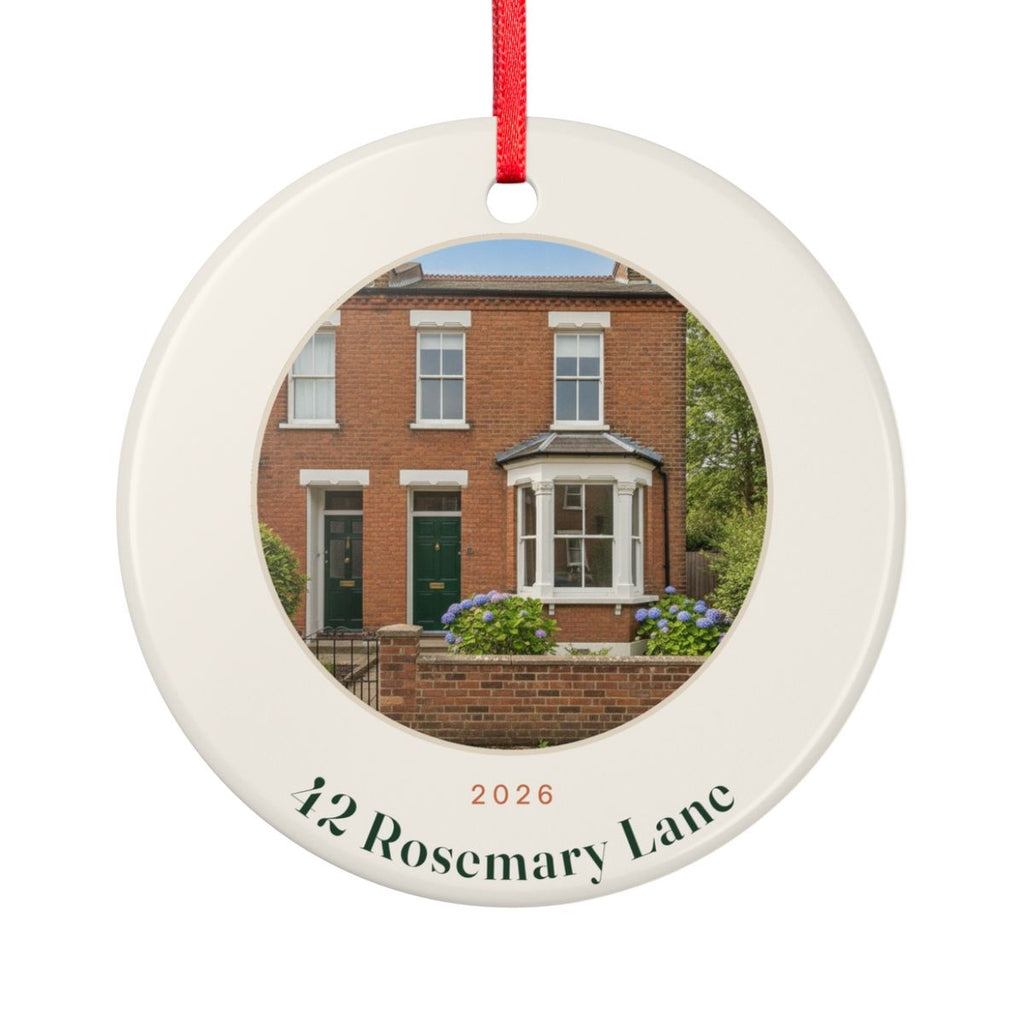 New home photo ceramic ornament mock-up seen from the other side, with the same sample brick house photo, '2026' and '42 Rosemary Lane'