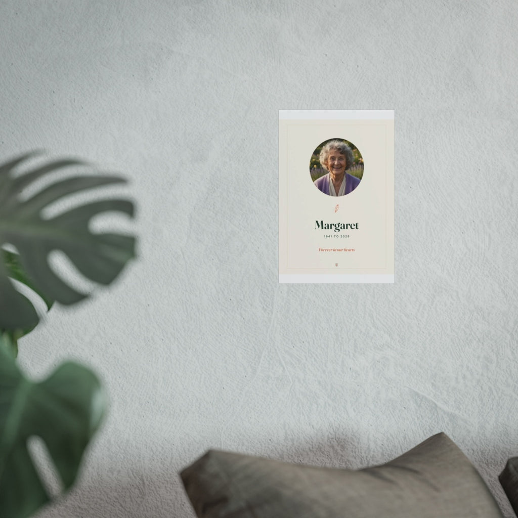 In Loving Memory photo print mock-up at the smaller size on a pale wall beside a monstera plant and a grey sofa