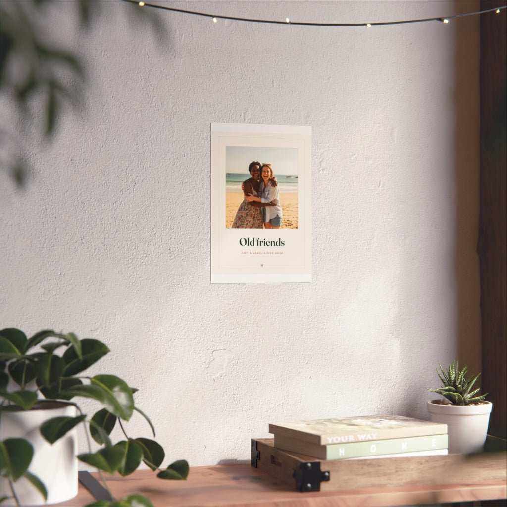 Photo print for friends mock-up in the smaller size on the sunlit white wall above the shelf, fairy lights overhead
