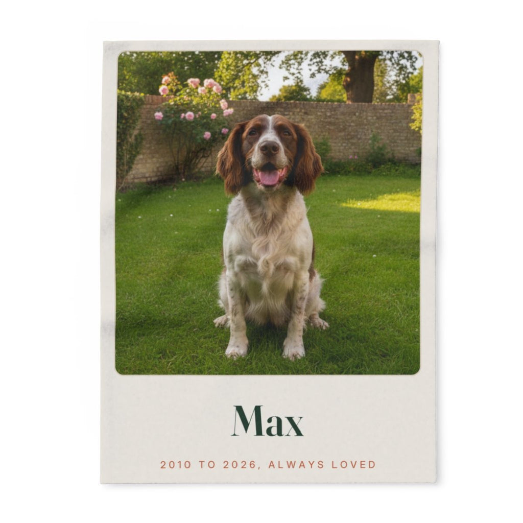Memorial photo fleece blanket mock-up laid flat, with a spaniel in a garden, 'Max' and '2010 to 2026, always loved'