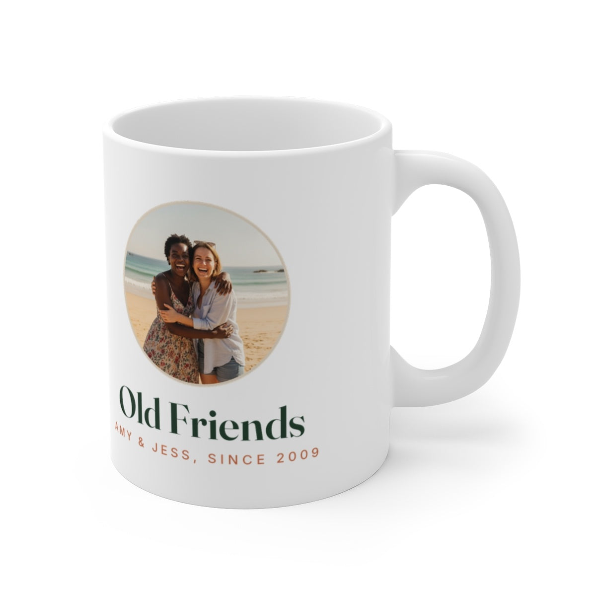 Photo mug for friends mock-up turned to show the handle on the right, round beach photo and 'Old Friends' on the side