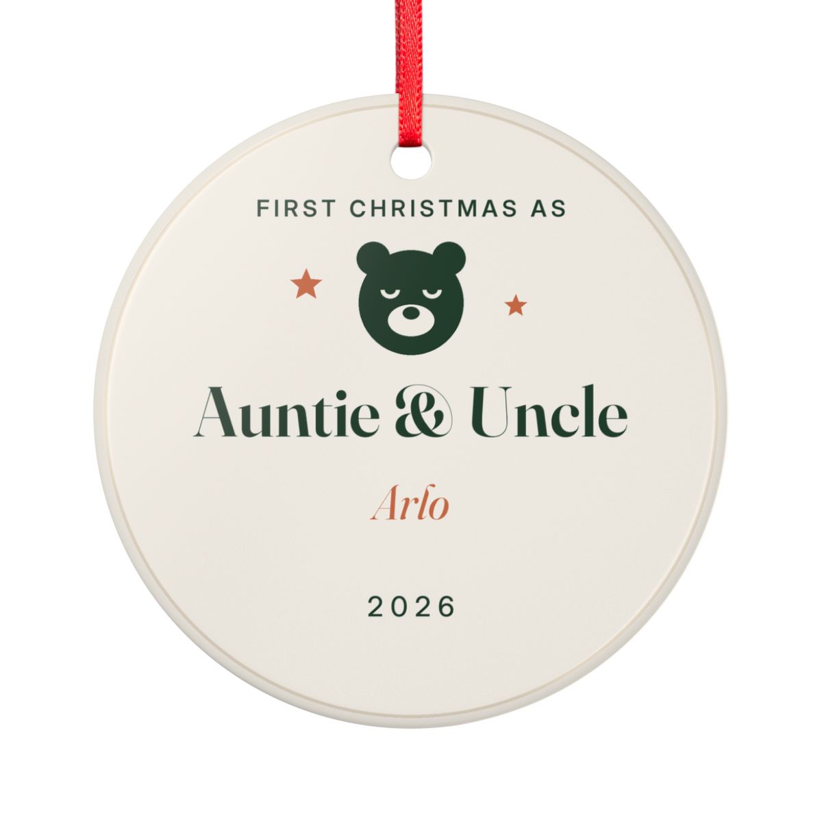 New Auntie and Uncle ornament mock-up seen from the other side, with the same bear face, 'First Christmas as Auntie & Uncle', 'Arlo' and '2026'
