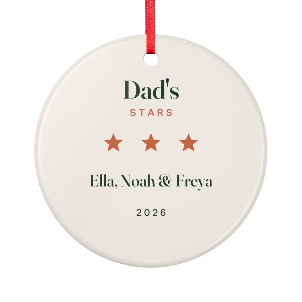 Dad's Stars Christmas ornament mock-up seen from the other side, with the same three orange stars, 'Ella, Noah & Freya' and '2026'