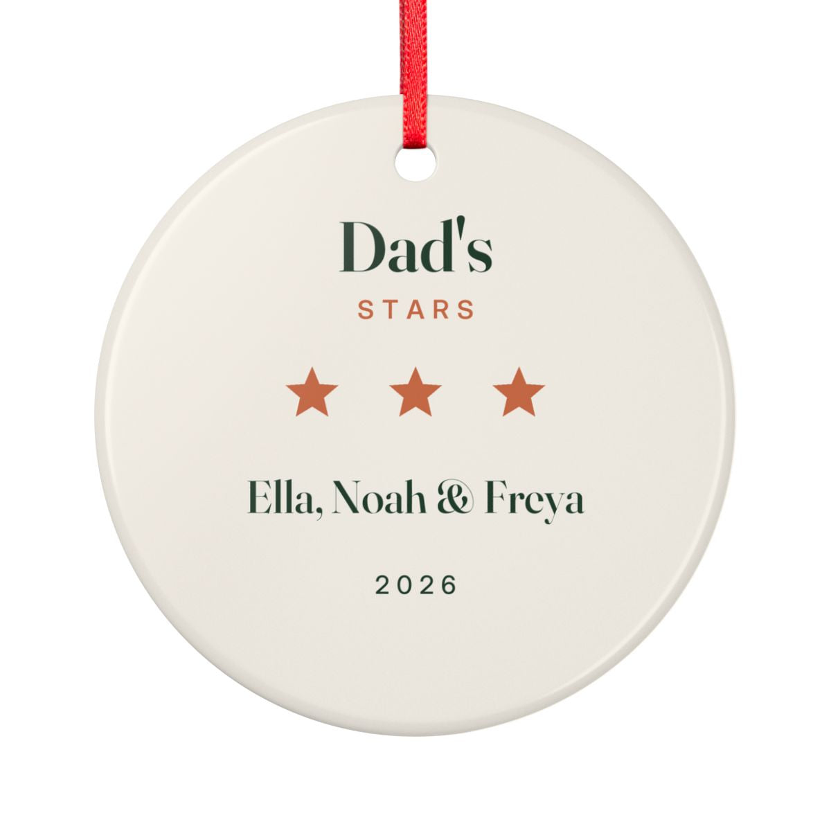 Dad's Stars Christmas ornament mock-up seen from the other side, with the same three orange stars, 'Ella, Noah & Freya' and '2026'