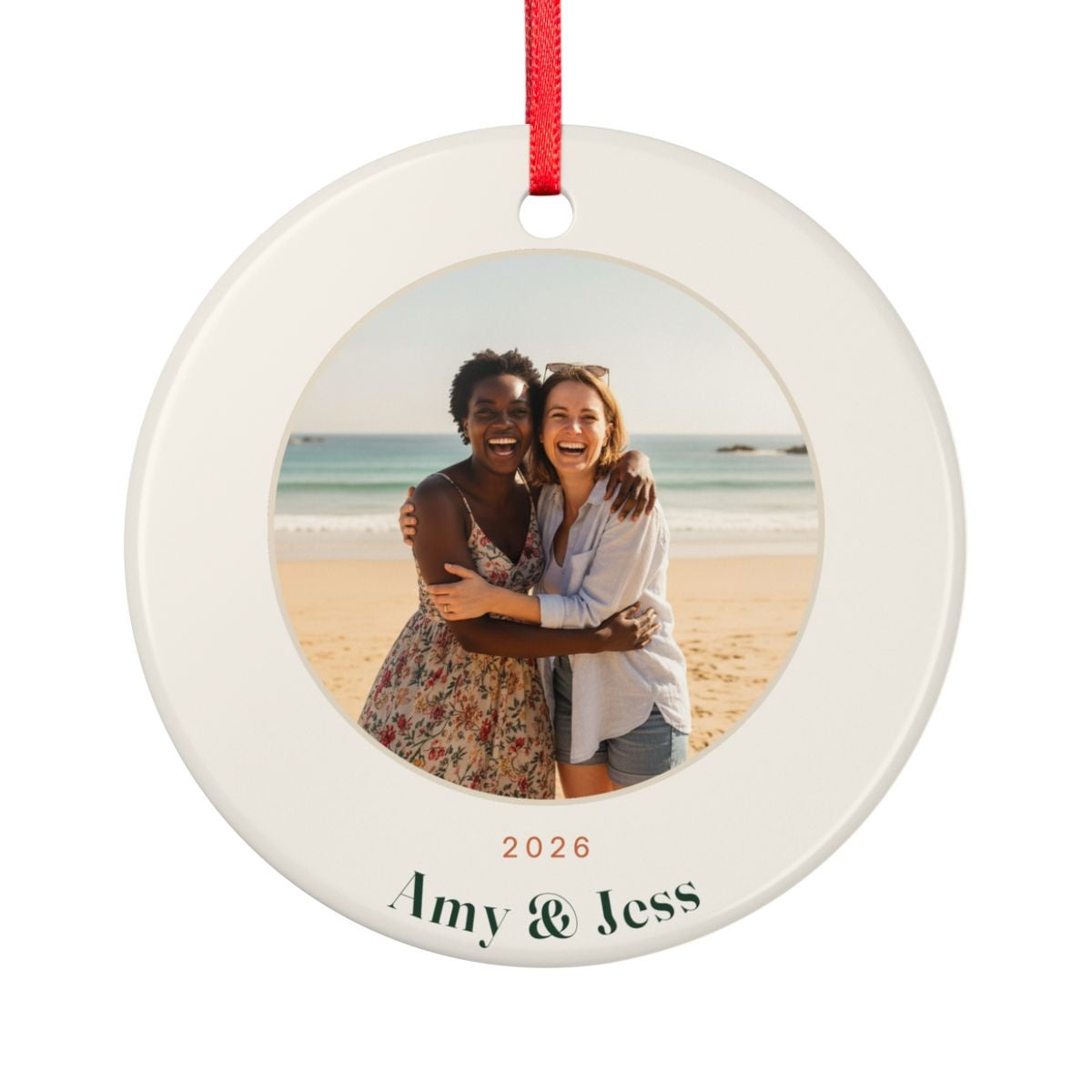 Photo ornament for friends mock-up seen from the other side, with the same sample beach photo, '2026' and 'Amy & Jess'