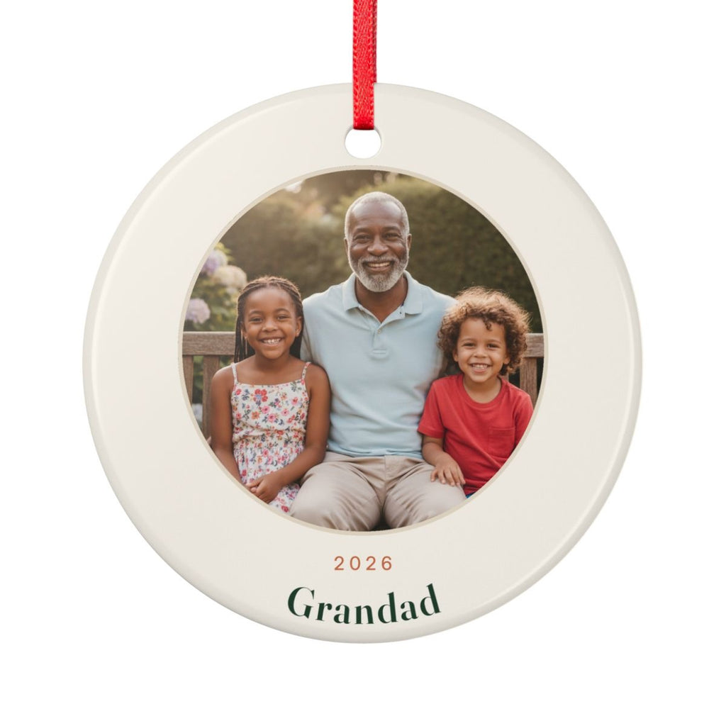 Personalised grandparents photo ceramic ornament mock-up on a red ribbon, sample photo showing a grandad and two children
