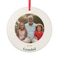 Personalised grandparents photo ceramic ornament mock-up on a red ribbon, sample photo showing a grandad and two children