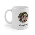 Personalised birthday photo mug mock-up, handle on the left, with a round sample photo, 'Margaret' and 'Happy 70th Birthday'