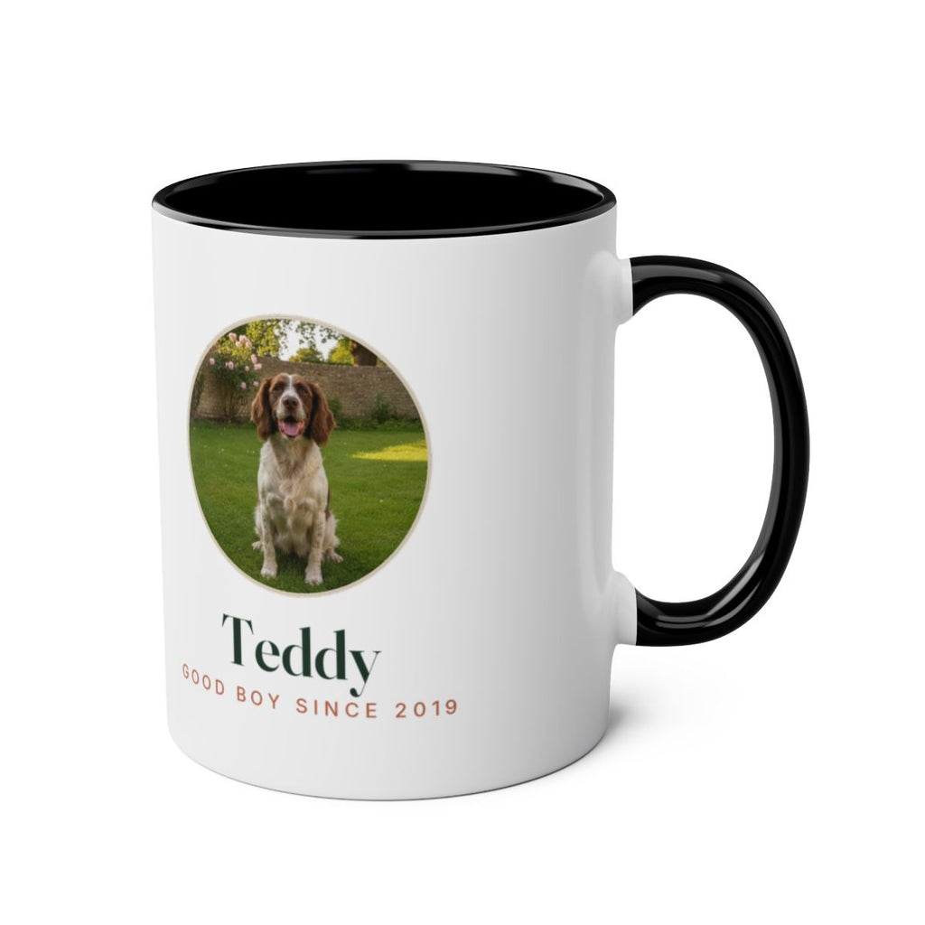 Dog photo two-tone mug mock-up in black, handle on the right, with a sample dog photo, 'Teddy' and 'Good boy since 2019'