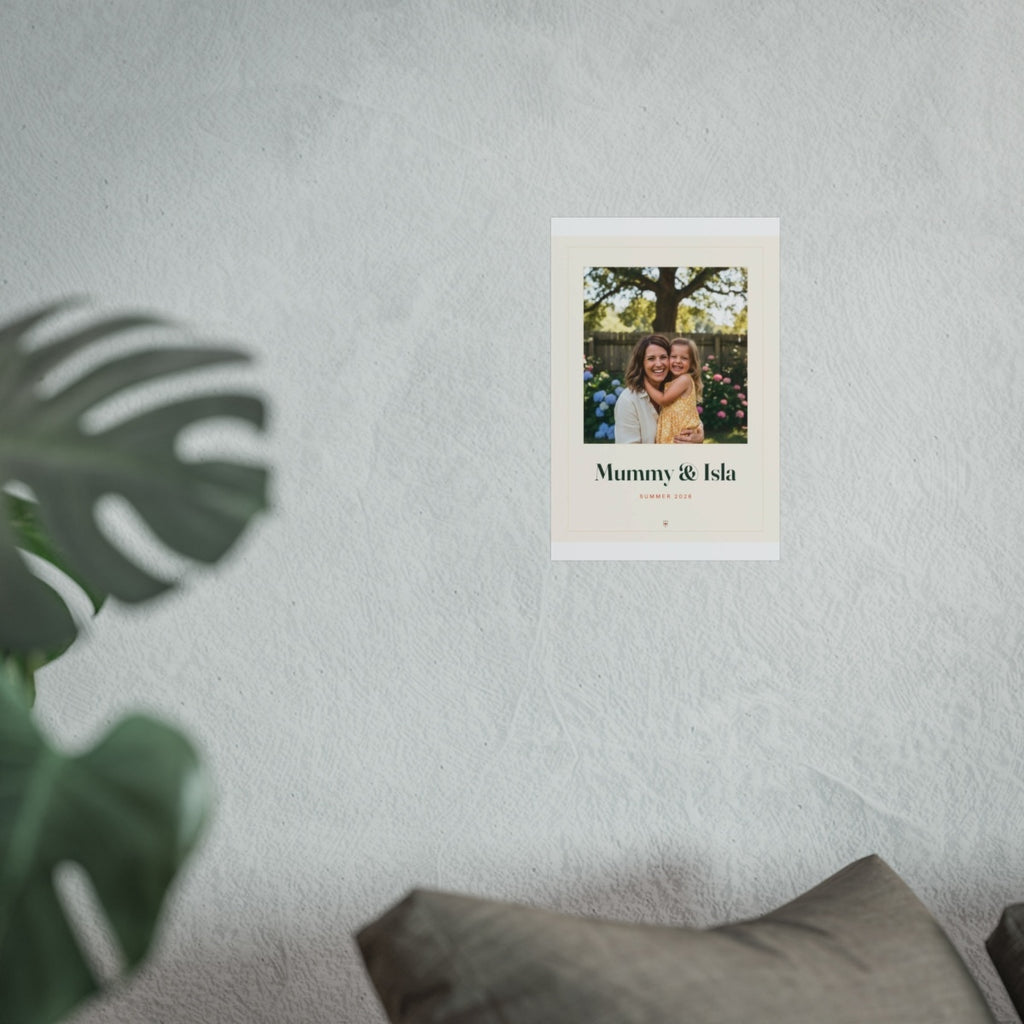 Personalised Mum photo print mock-up in the smaller 8 x 12 in size on the pale wall above the grey sofa cushions