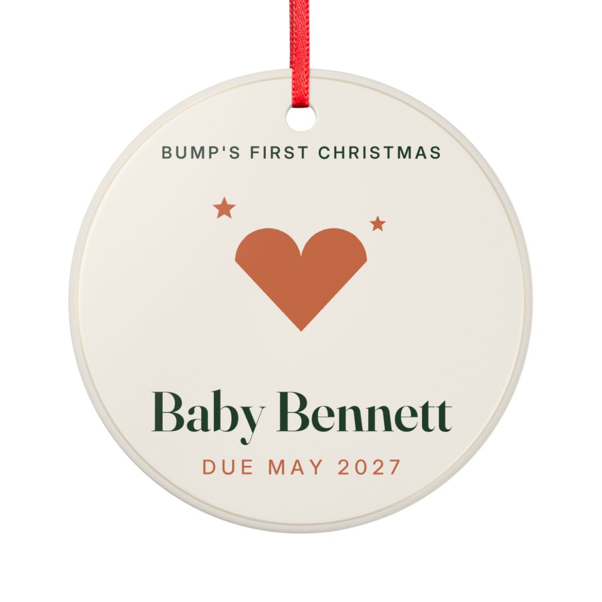 Bump's First Christmas ornament mock-up seen from the other side, with the same orange heart, 'Baby Bennett' and 'Due May 2027'