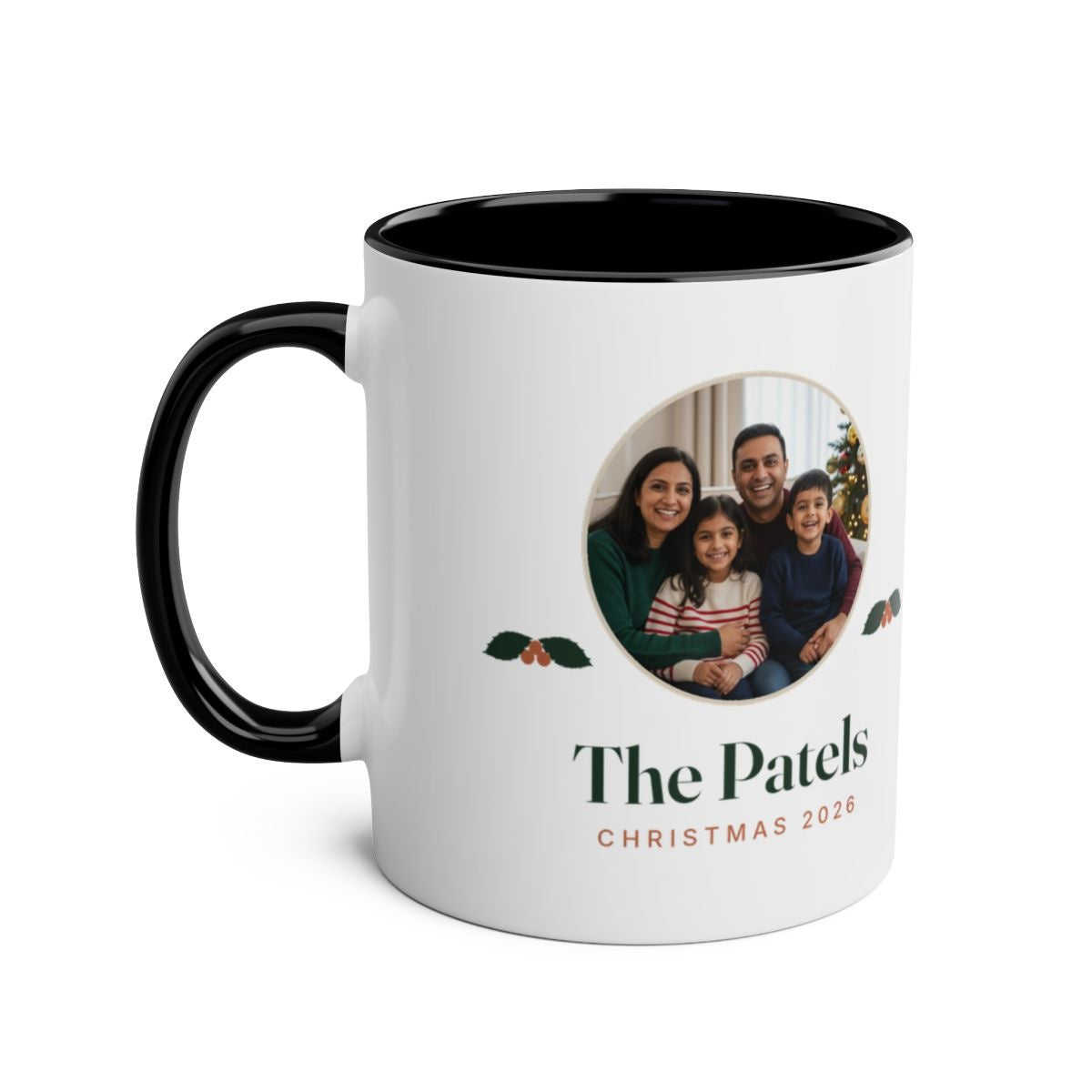 Christmas photo two-tone mug mock-up in the black colour, handle on the left, with the round family photo and 'The Patels'