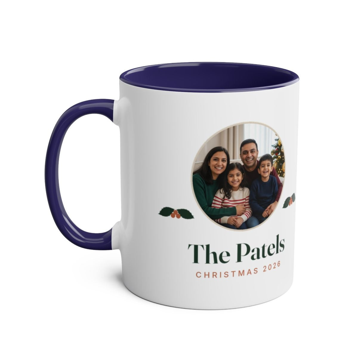 Christmas photo two-tone mug mock-up in the dark blue colour, handle on the left, with the family photo and 'The Patels'