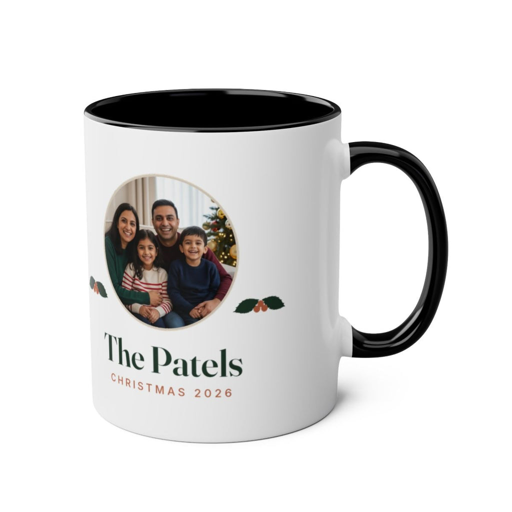 Christmas photo two-tone mug in black with the handle on the right, showing the family photo and holly on the other side