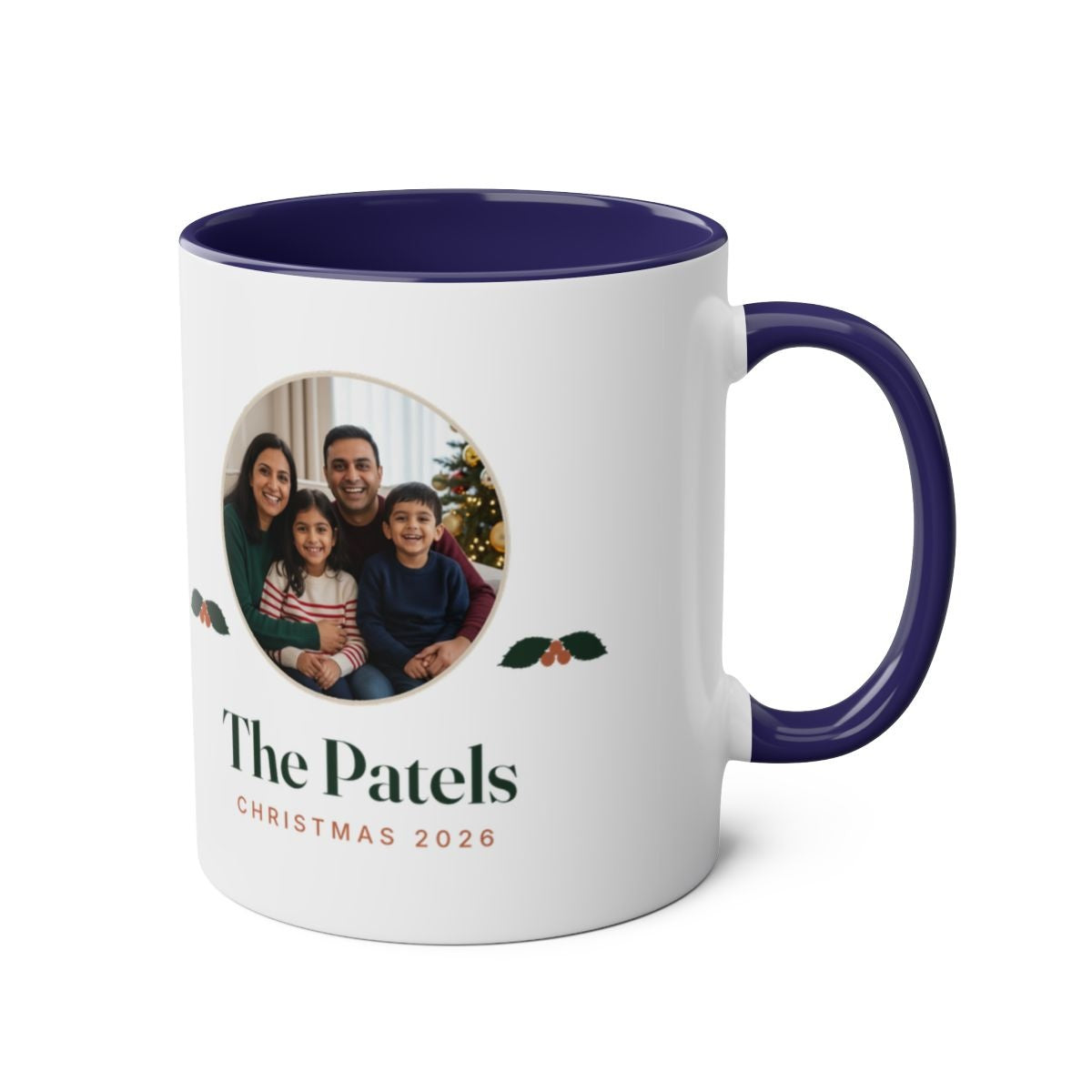 Christmas photo two-tone mug in dark blue with the handle on the right, showing the family photo and holly on the other side