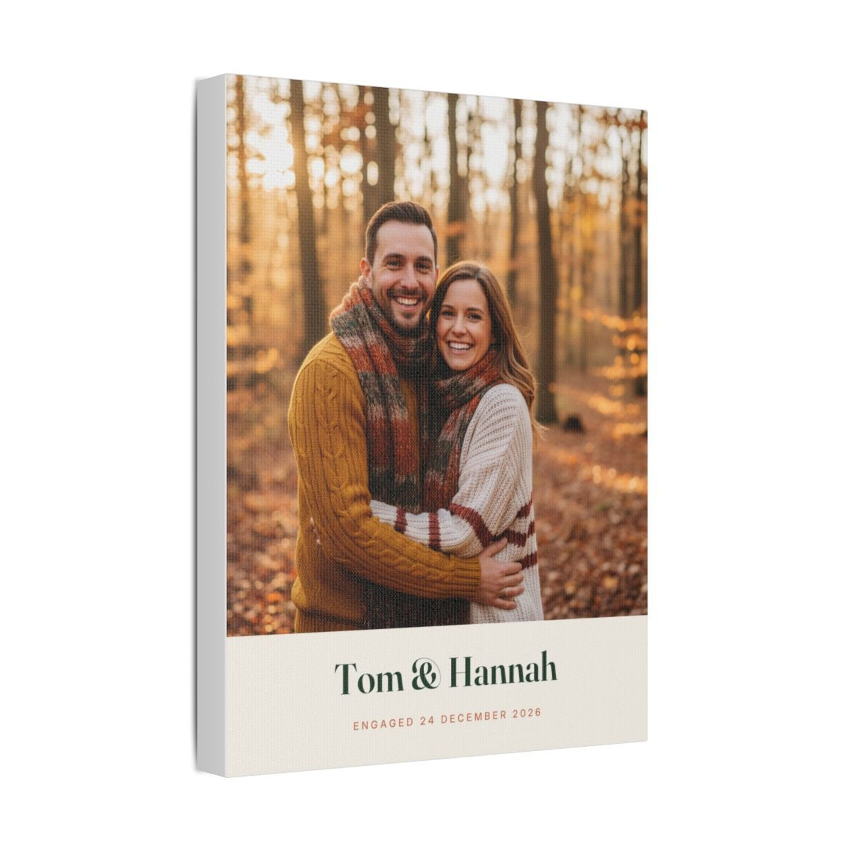 Engagement photo canvas mock-up at an angle showing the wrapped edge, sample couple photo and 'Tom & Hannah'