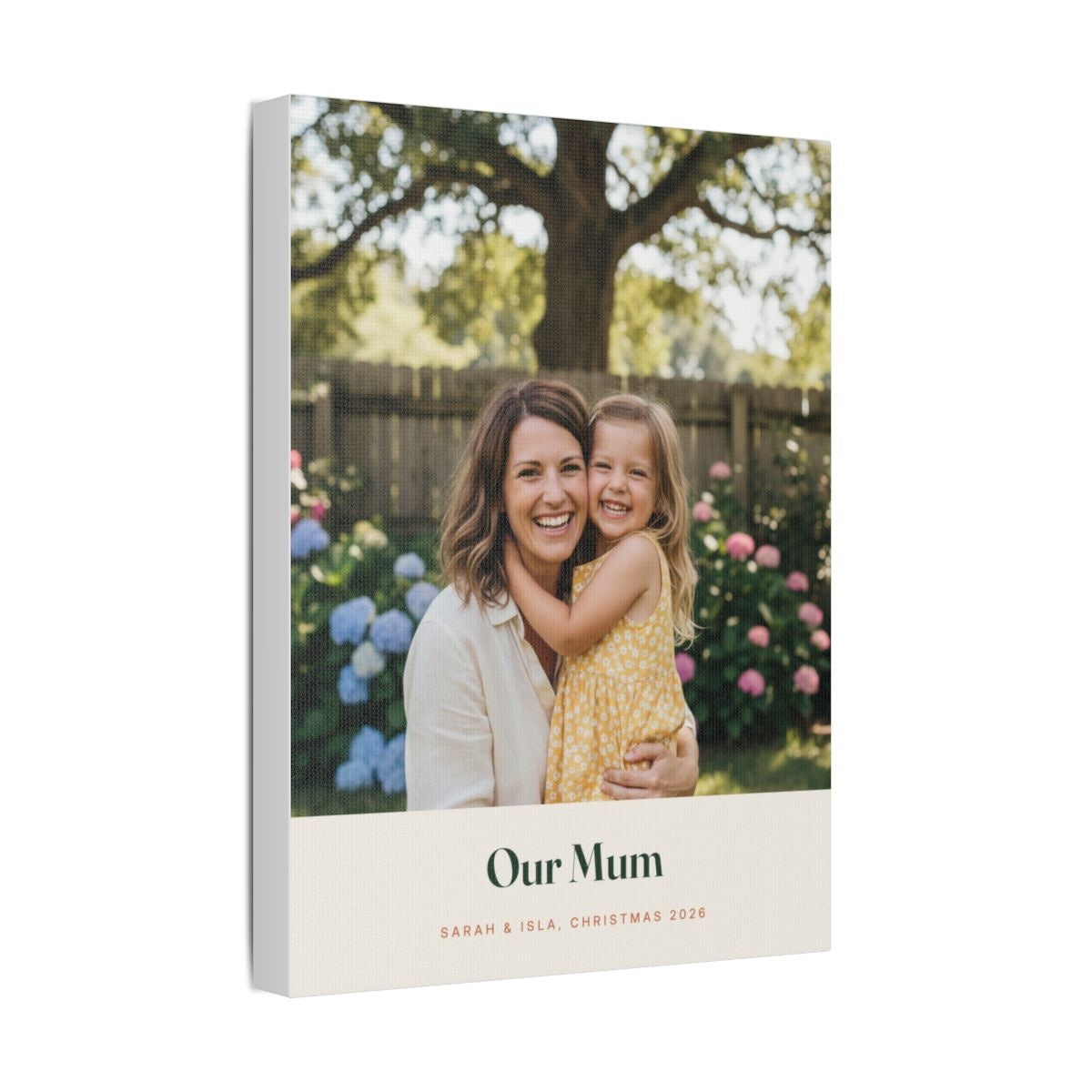 Personalised Mum photo canvas mock-up angled to show the wrapped canvas edge, sample caption 'Our Mum' beneath the photo