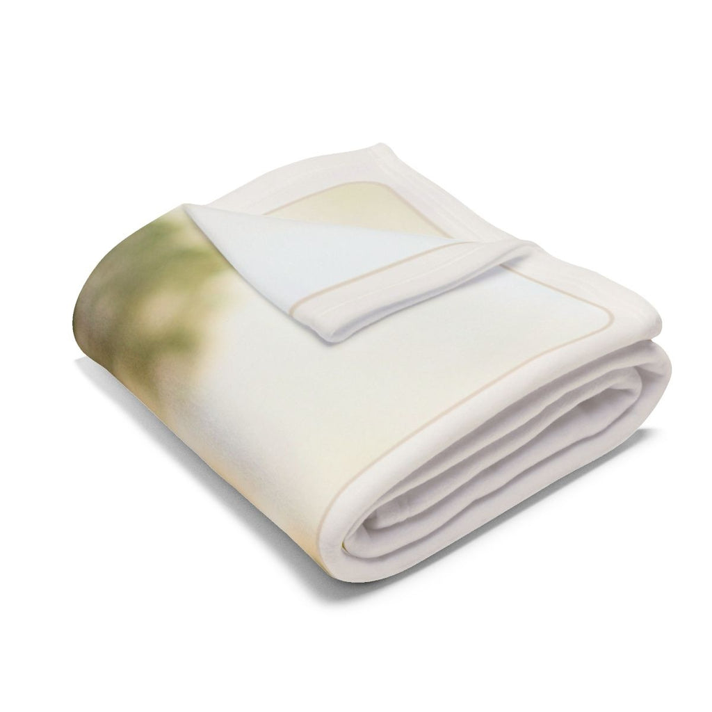 Personalised Dad photo fleece blanket mock-up folded, showing the blurred green park photo and its cream border