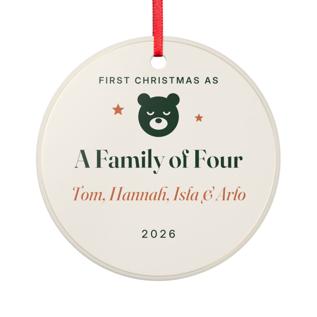 First Christmas as a family ornament mock-up seen from the other side, with the same green bear, 'A Family of Four', 'Tom, Hannah, Isla & Arlo' and '2026'