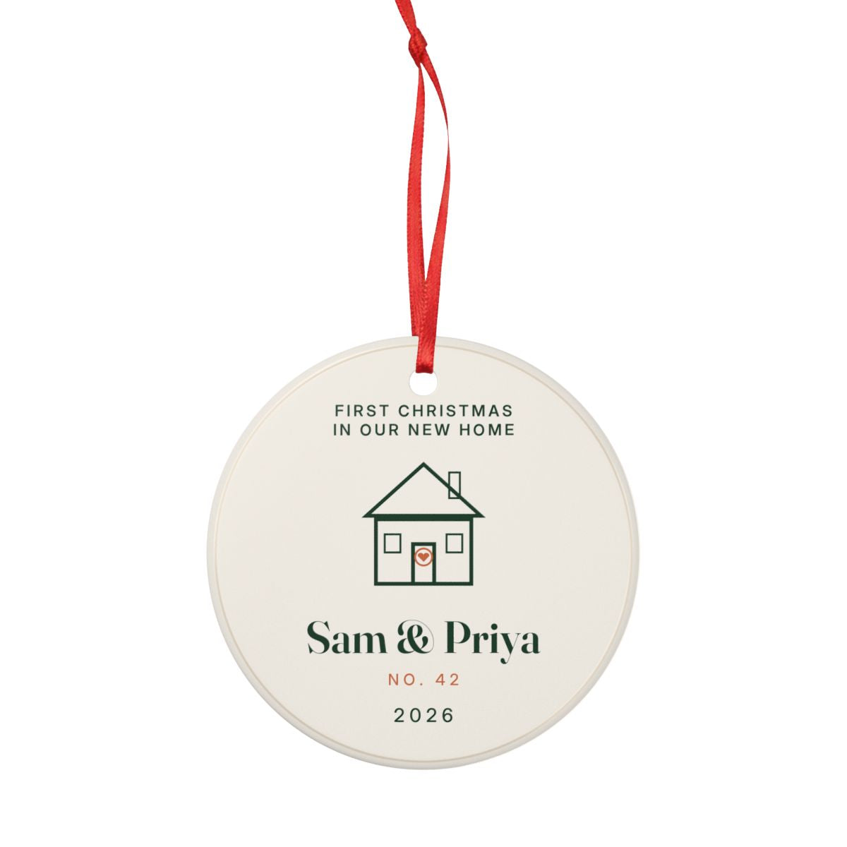 Personalised first Christmas in our new home ornament mock-up hanging on its red ribbon with the house drawing
