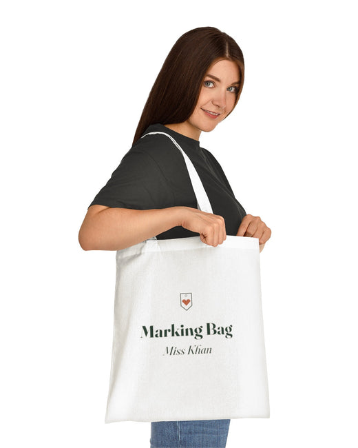 Woman carrying a Marking Bag tote over her shoulder, with the example name Miss Khan