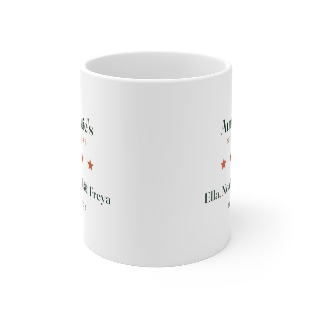 Auntie's Stars mug mock-up seen with the handle hidden behind, the sample-name print showing partly on both sides