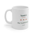 Personalised Auntie's Stars mug mock-up, handle on the left, with three orange stars, 'Ella, Noah & Freya' and '2026'