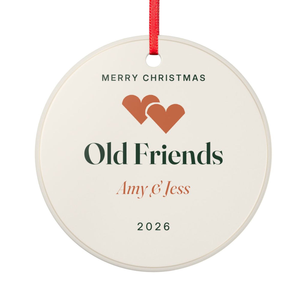Personalised friends ceramic Christmas ornament mock-up on a red ribbon, two hearts, 'Old Friends', 'Amy & Jess' and '2026'