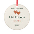 Personalised friends ceramic Christmas ornament mock-up on a red ribbon, two hearts, 'Old Friends', 'Amy & Jess' and '2026'