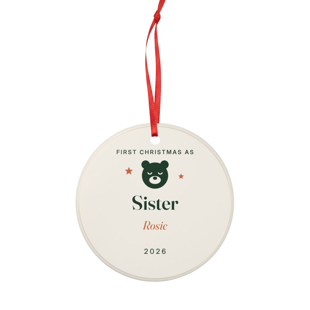 First Christmas as Sister ornament hanging from its red ribbon, seen from the other side with the same design