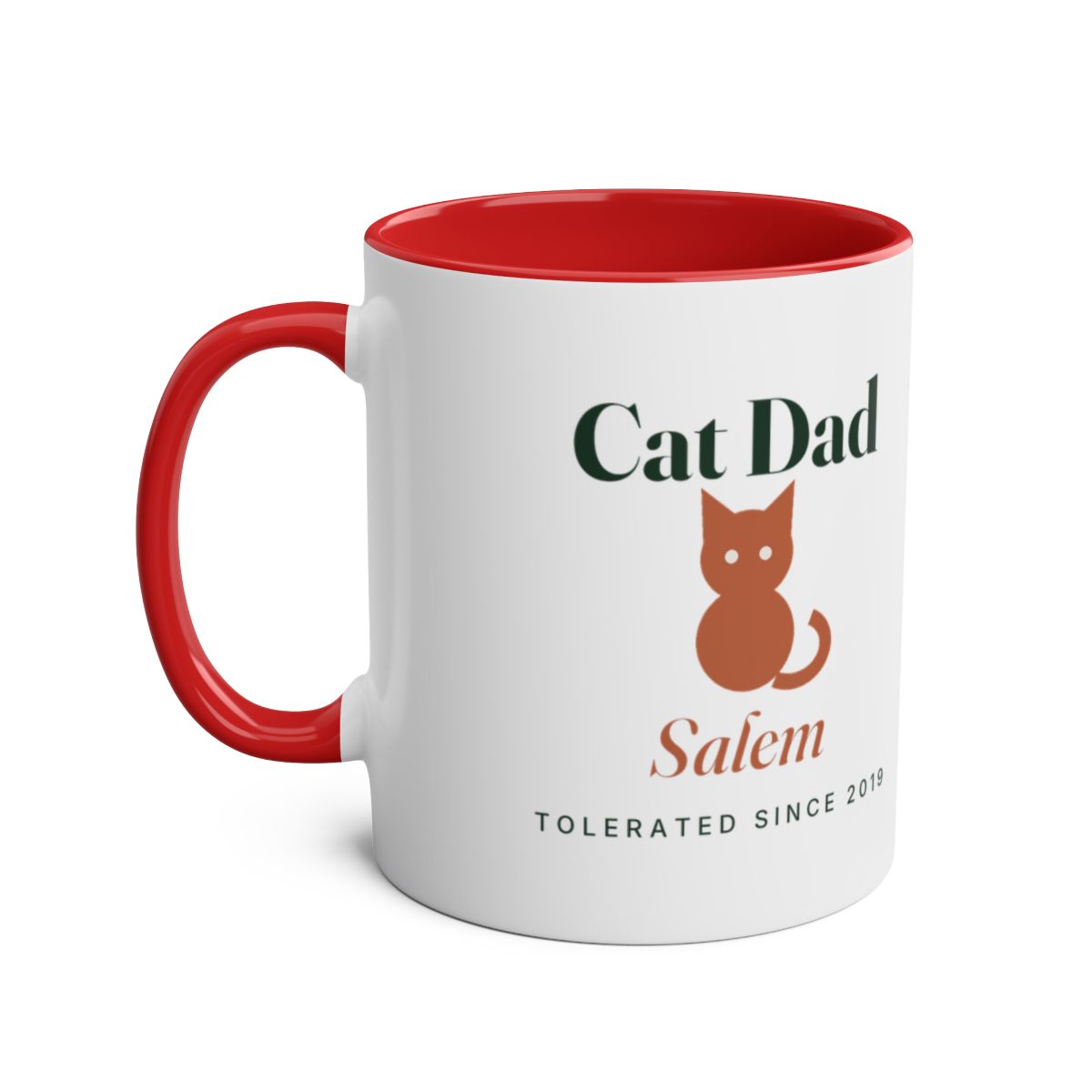 Personalised Cat Dad two-tone mug mock-up, red inside and handle, with a cat silhouette, 'Salem' and 'Tolerated since 2019'