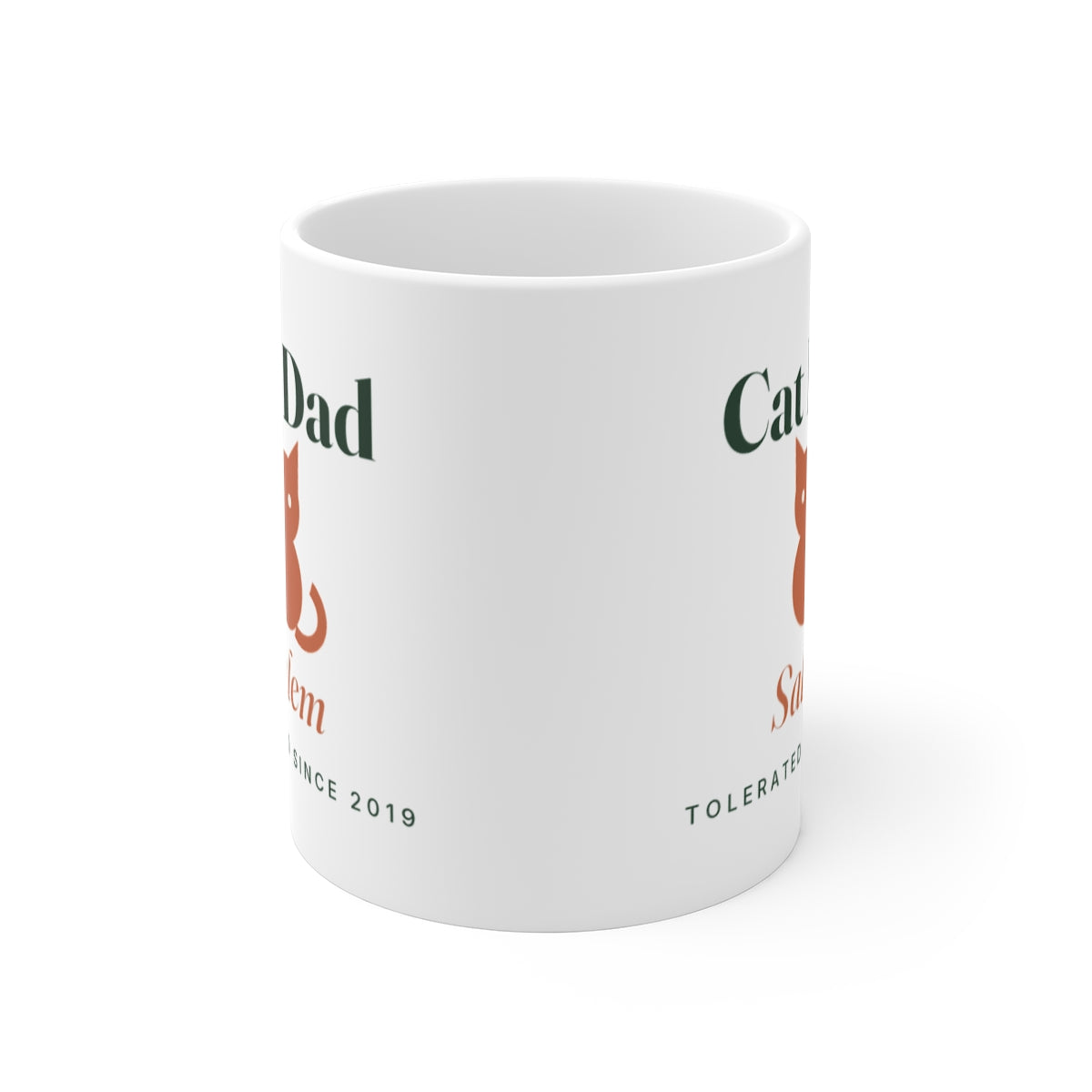 Cat Dad mug seen from the front with the handle hidden, the cat print showing partly on both sides