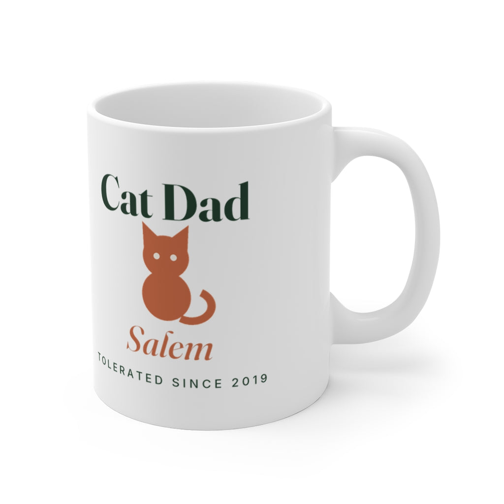 Cat Dad mug mock-up with the handle on the right, showing the orange cat silhouette and 'Salem'
