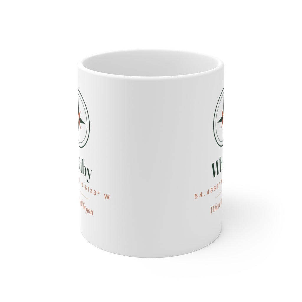 Personalised coordinates mug mock-up seen from the front, showing the 'Whitby' design printed on both sides