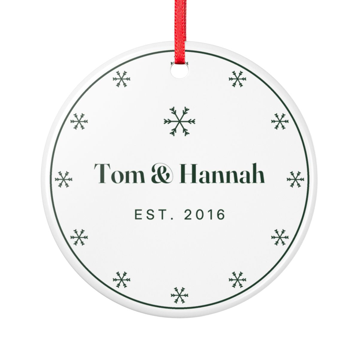 Personalised couple's Christmas ornament mock-up, round ceramic ornament with snowflakes, 'Tom & Hannah' and 'Est. 2016'
