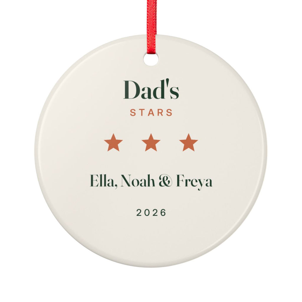 Personalised Dad's stars Christmas ornament mock-up, cream ceramic ornament with 'Dad's Stars', three stars and 'Ella, Noah & Freya'