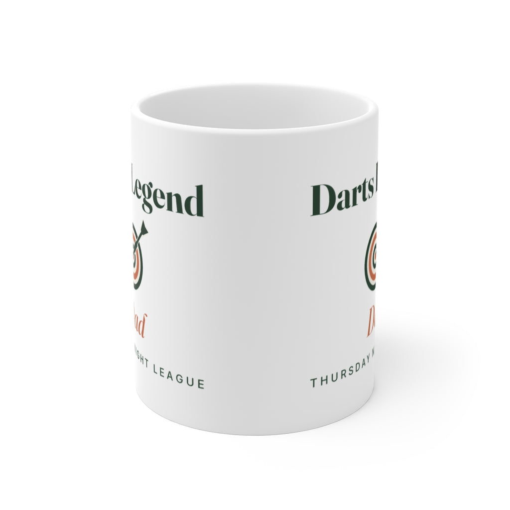 Personalised darts legend mug mock-up seen from the front, showing the 'Darts Legend' design printed on both sides