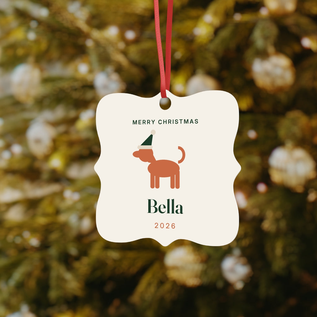 Dog aluminium Christmas ornament mock-up hanging on a Christmas tree, with a Santa-hat dog, 'Merry Christmas' and 'Bella'