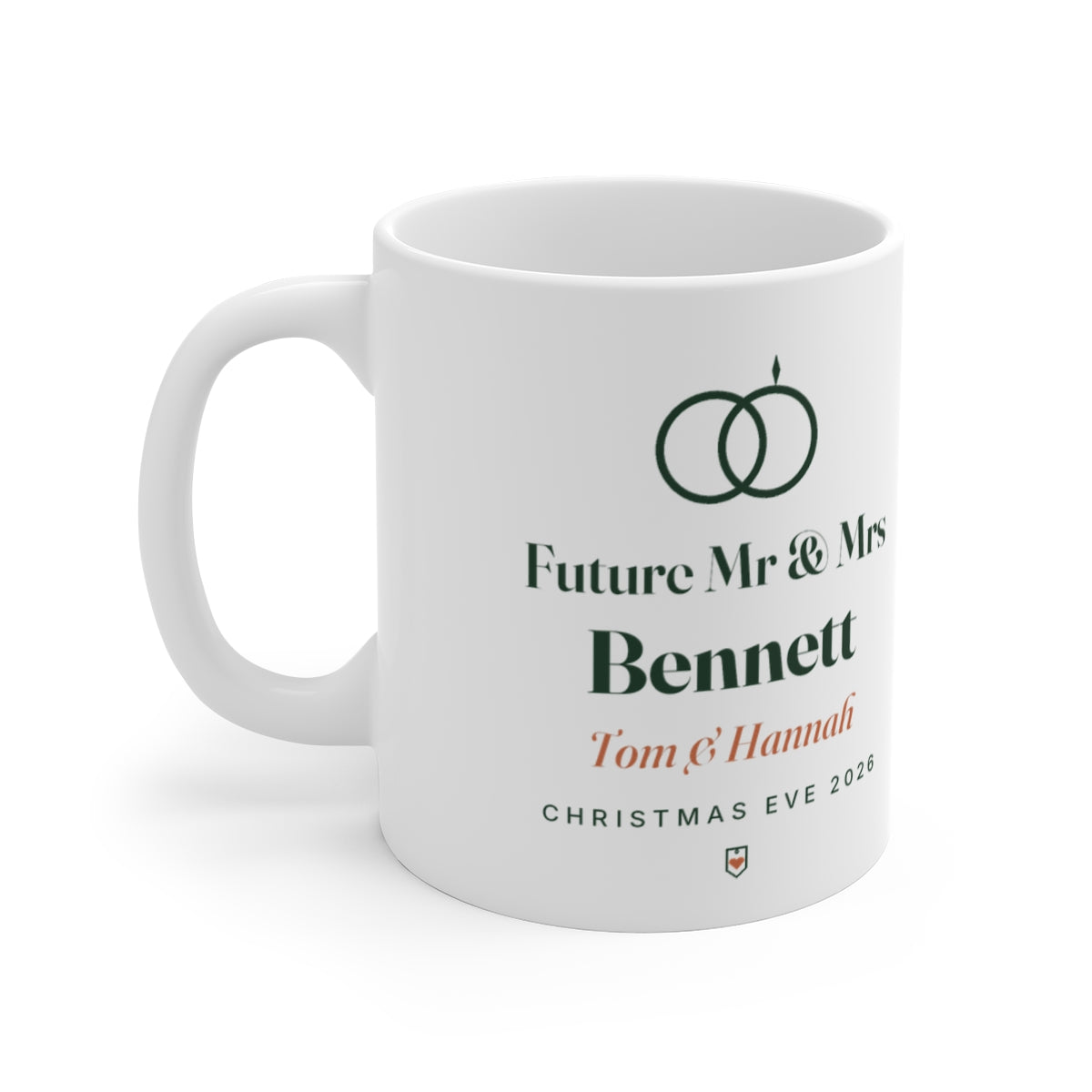 Engagement white mug mock-up with two linked rings, 'Future Mr & Mrs', 'Bennett', 'Tom & Hannah' and 'Christmas Eve 2026'