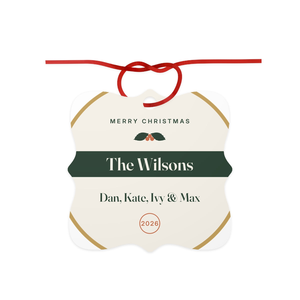 Family aluminium Christmas ornament mock-up with a red ribbon bow, holly, 'The Wilsons', 'Dan, Kate, Ivy & Max' and '2026'